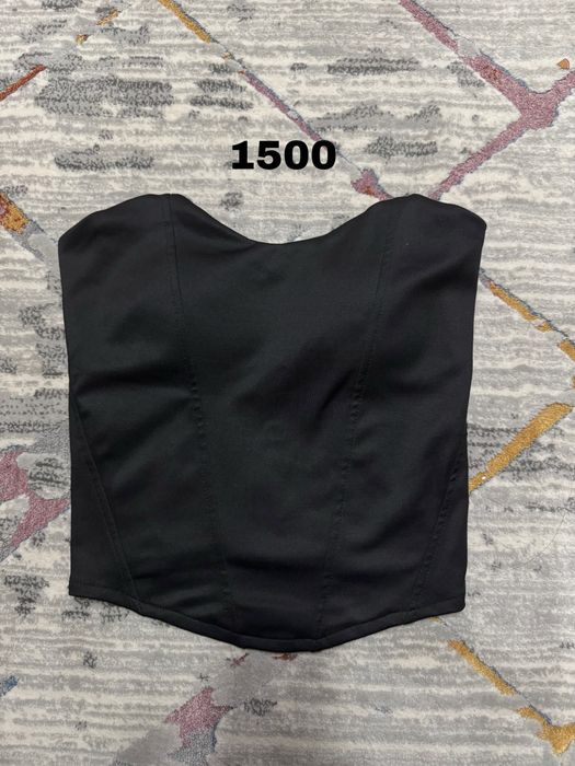 Женские одежды .