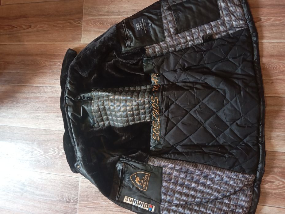 Продам теплую куртку,оригинал