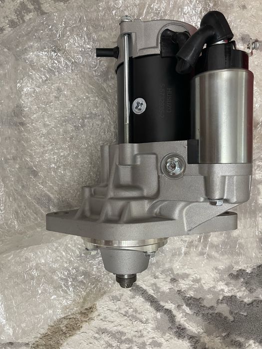 Стартер от Исузу грузовой