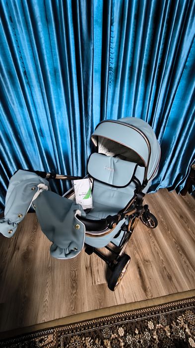 Детская коляска из кож.заменителя