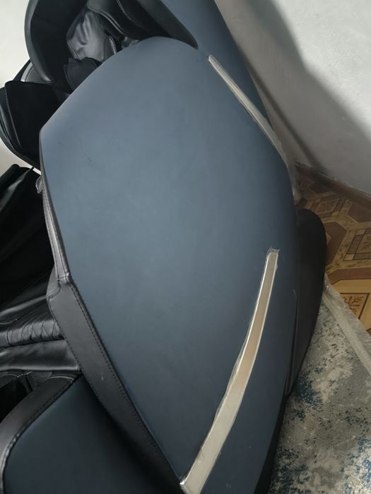 Массажный кресло