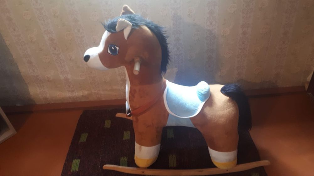 Продам игрушку лошадку