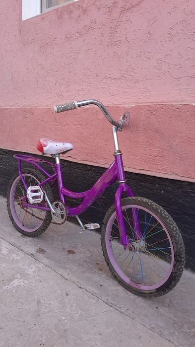 Велосипед қыз балаға