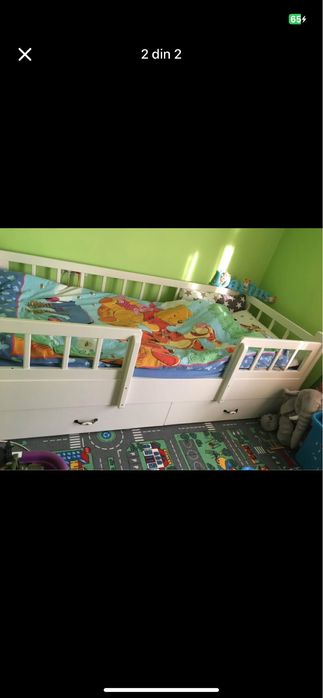 Pat din lemn masiv .