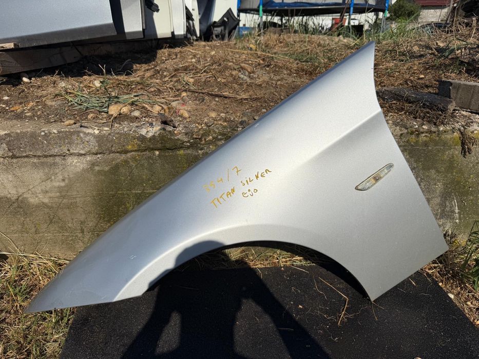 Aripa stanga fata BMW E90 E91 cod culoare 354/7 titan silver