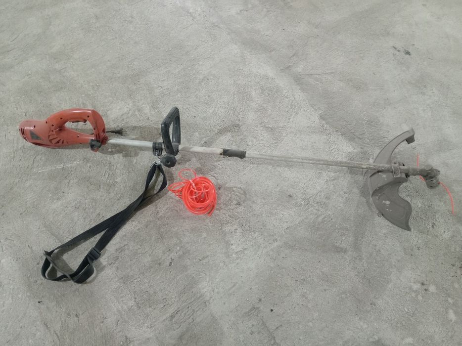 Электрическая газонокосилка