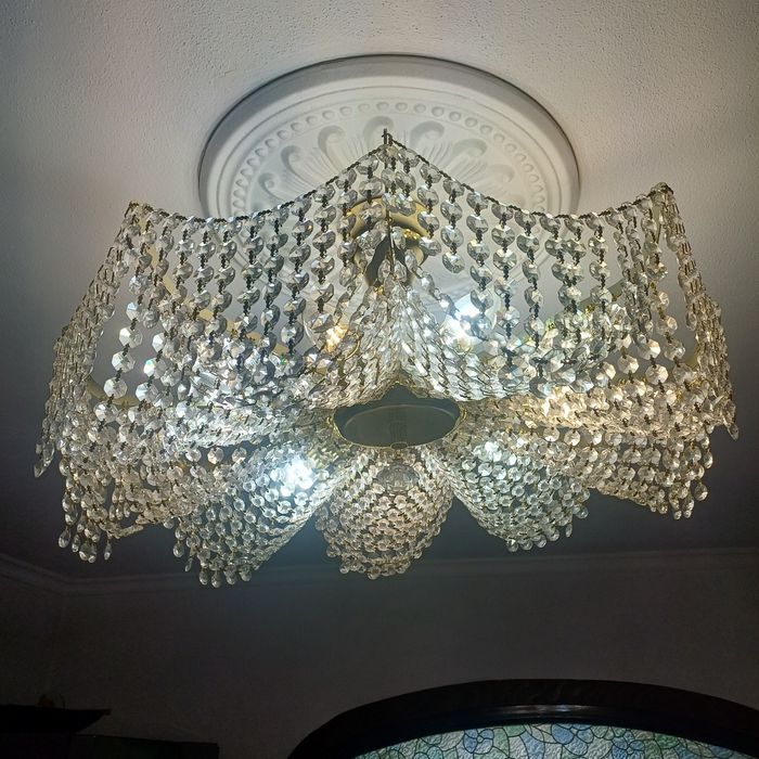 Candelabru cristal .