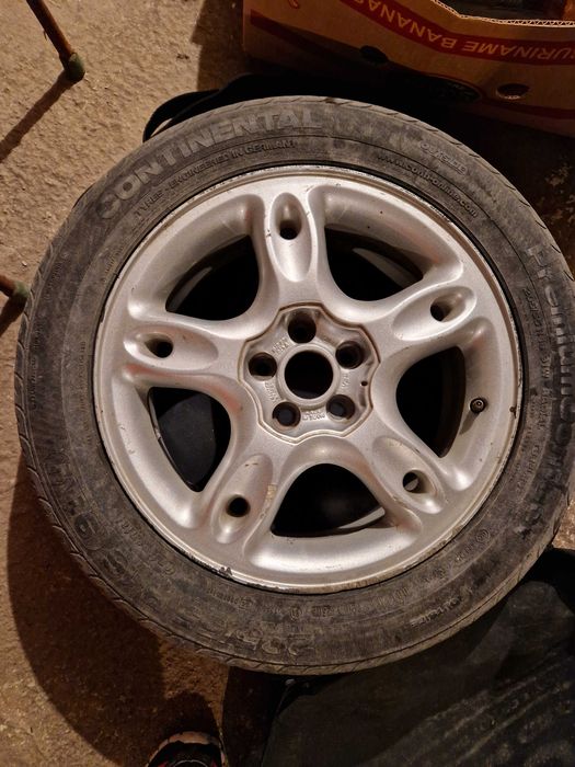 Vând jantă aluminiu 5 x 100 cu cauciuc