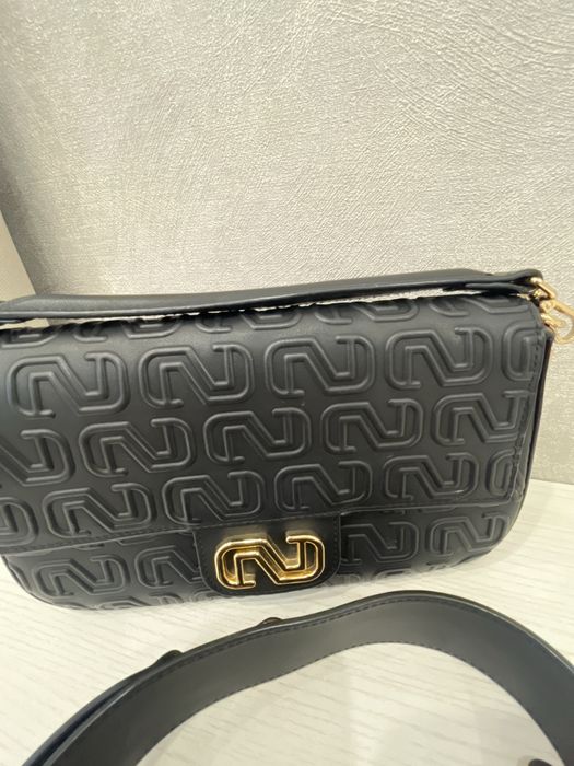 Кожаная сумка Nursace