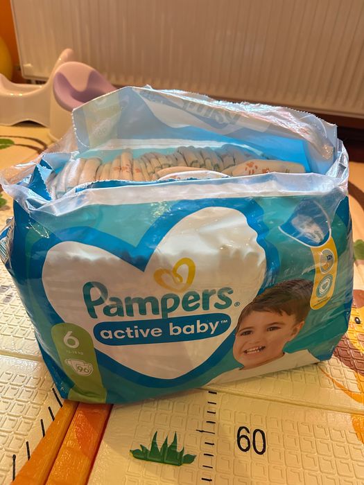 Pampers, ambalaj deschis cu 91 de bucati, marimea 6
