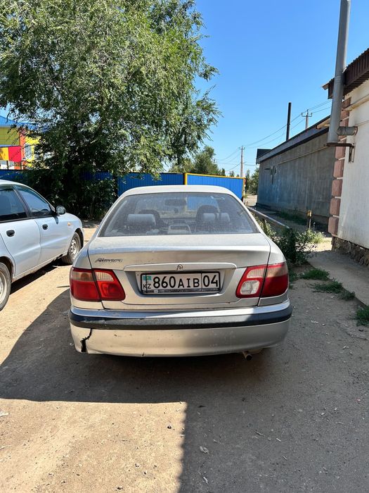 МашинаNissan almera