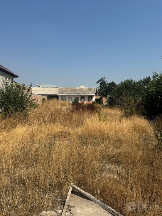 Sentr, tenisni kort va oybek yonida yulni buyiga 70m