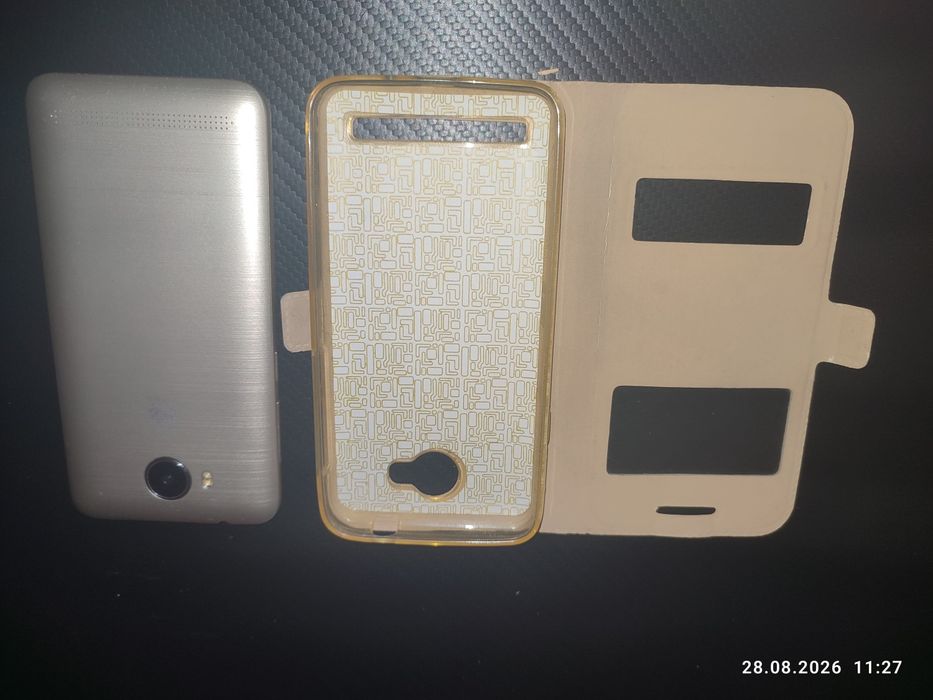Продам Huawei LUA-U22, б/у + Чехол книжка