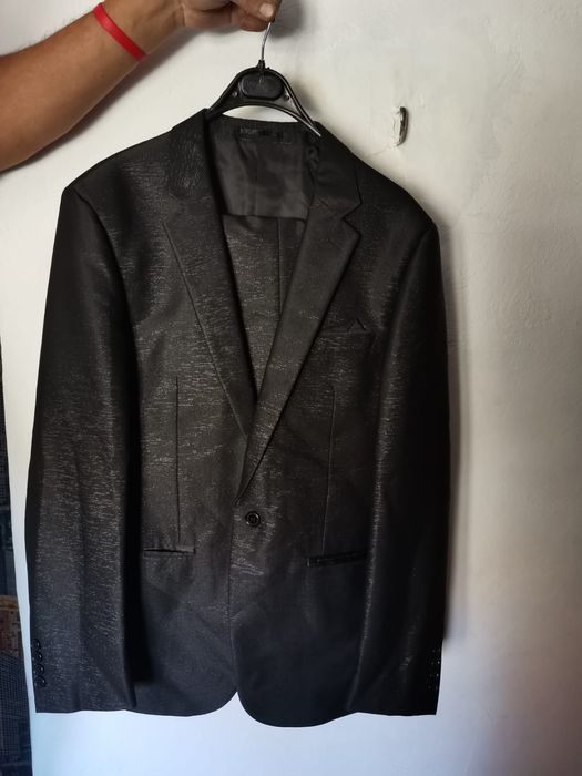 Продам костюм новый