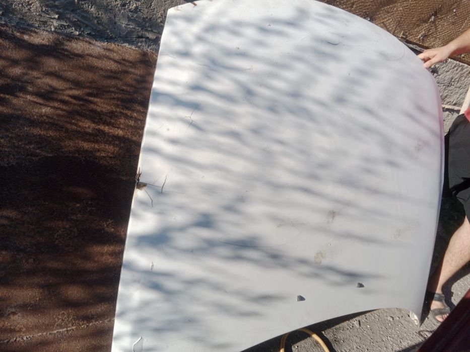 Мазда Кронос капот