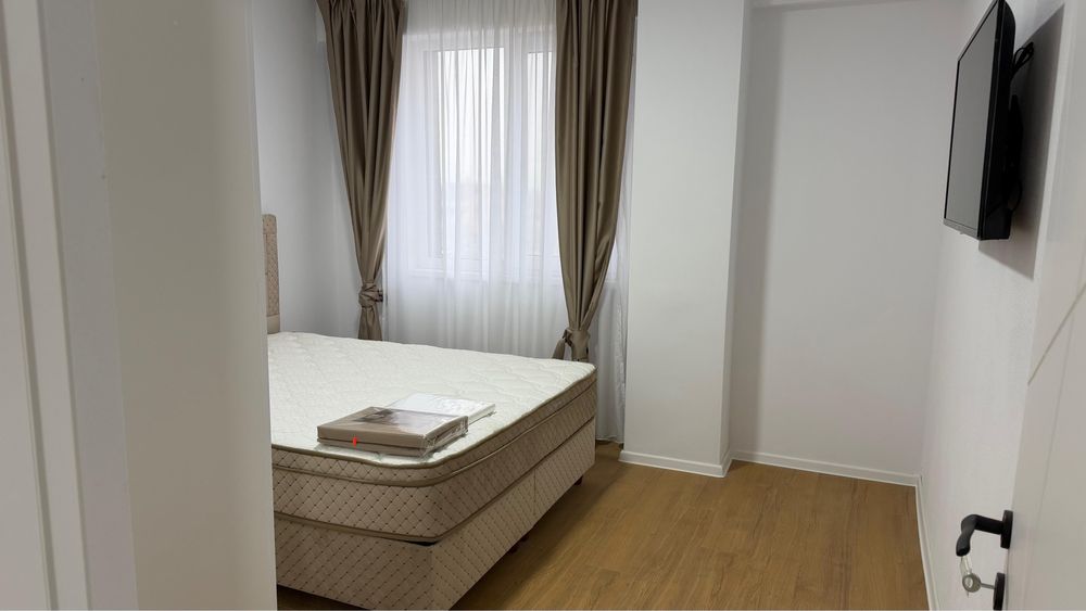 Persoana Fizica  vand Ap. 2 camere  etaj 2 bloc  nou  cu lift,mobilat