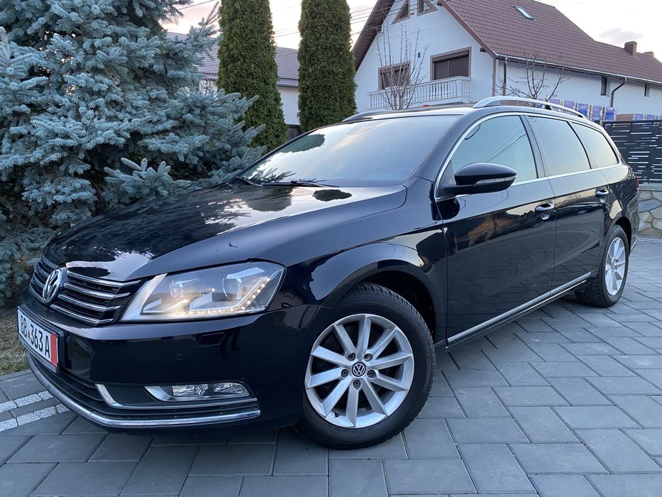 VWPassat Highline 2,0-Tdi-170-Cp-Bi-Xenon--Automată-padele-volan