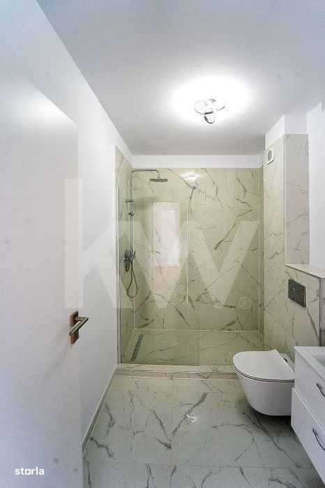 Apartament 3  camere - finisat la cheie, intabulat