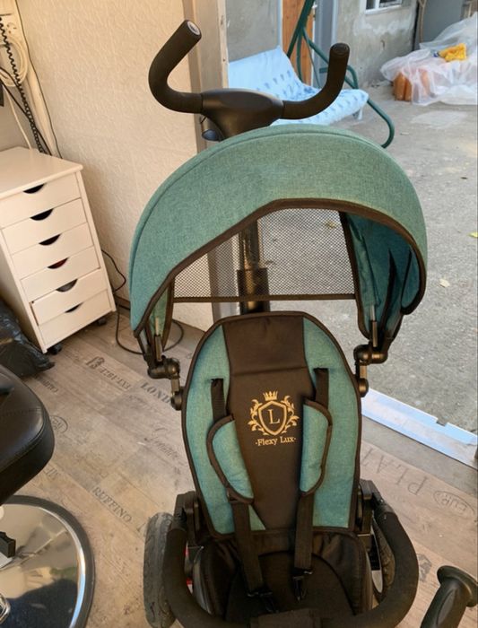 Tricicletă pliabilă cu scaun reversibil