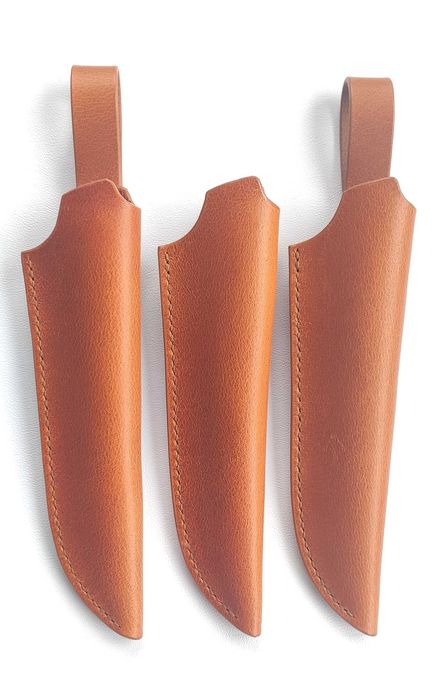 Кожени ръчно изработени кании за ножове с рисунка и без