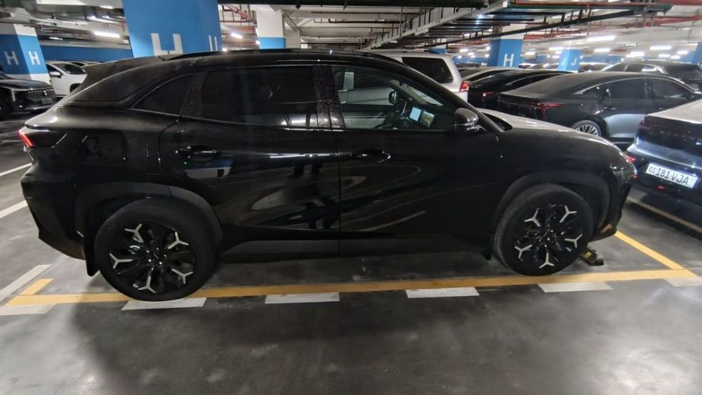 Chery Kampanyaga tegishli Nomi Aiqar EQ7 Elektromobil
