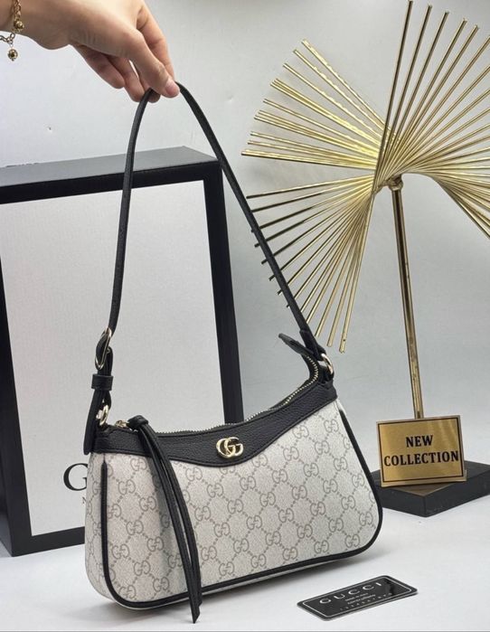 чанти/портмонета Guess,LV,Prada и още
