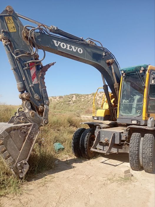 Экскаватор хизмати