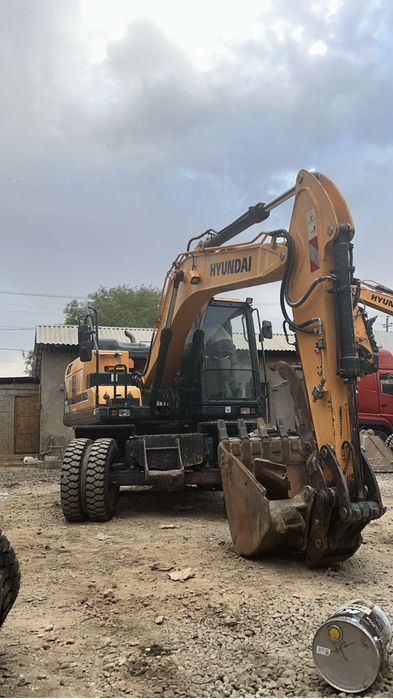 Экскаватор колесный гидромолот опытный оператор