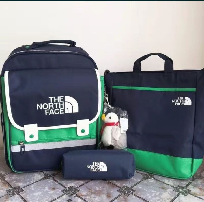 Новые портфели  школьникам