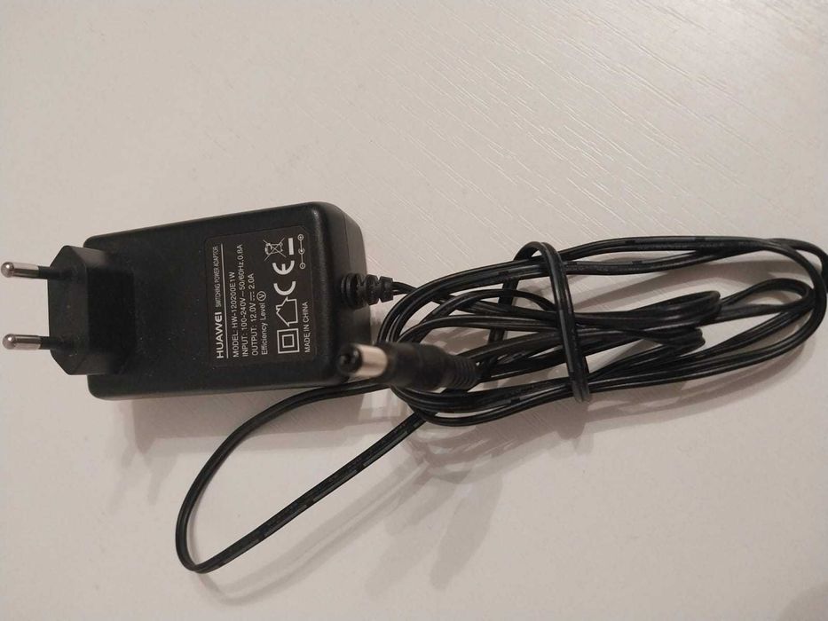 Адаптер 9 в AC ADAPTOR  и 12 в  HUAWEL