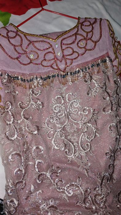 Kelinlik kòylagi Kam kiyilgan