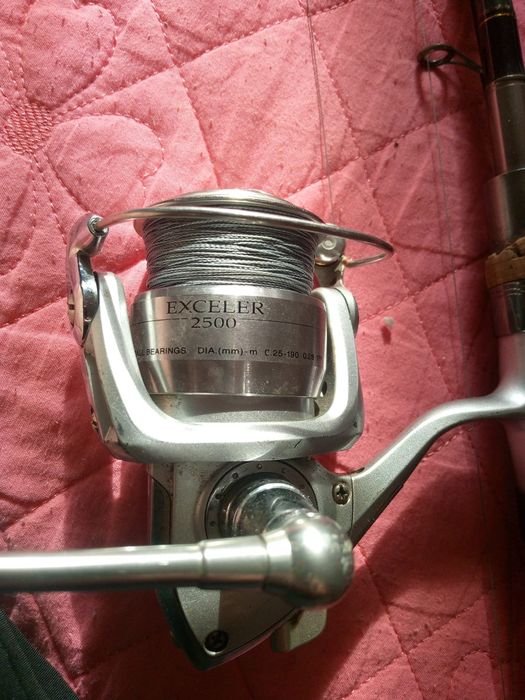 один спиннинг и одна катушка