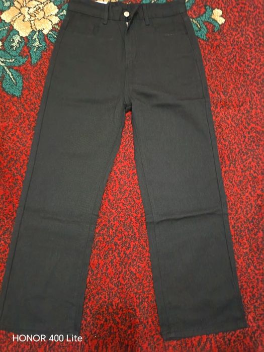 Продается Джинсы черный