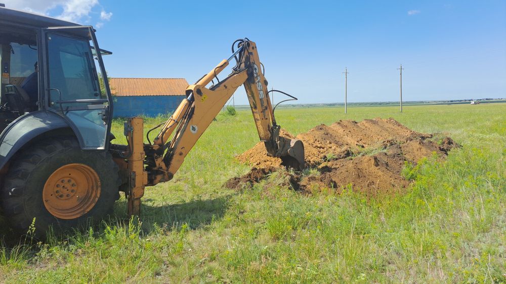 Экскаватор погрузчик 3в1