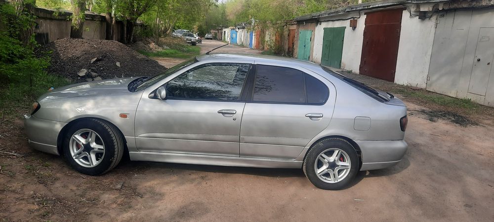 Нисан примьера p11