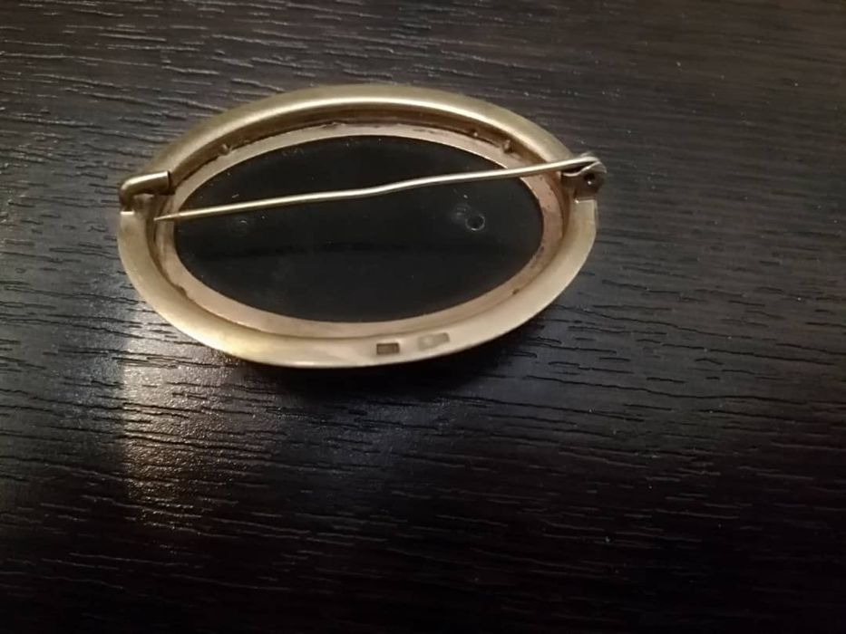 Антиквариат брошь серебро.