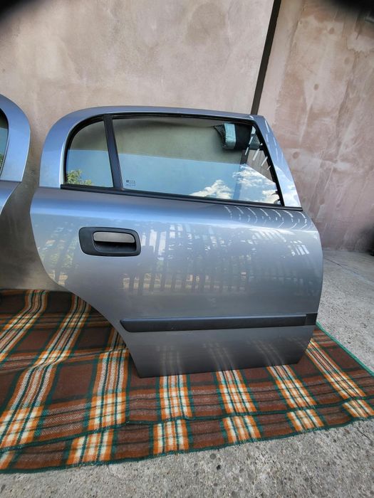 Usi spate opel astra g
