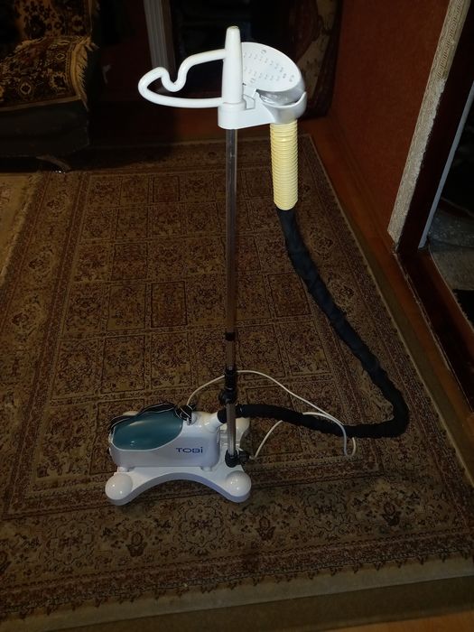 Паровой утюг TOBI.