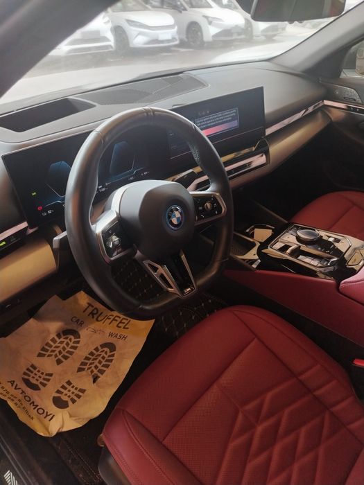 BMW i5 qoaraga qizil probeg 11300 Narx 58300 dollar ND Bob chqadi