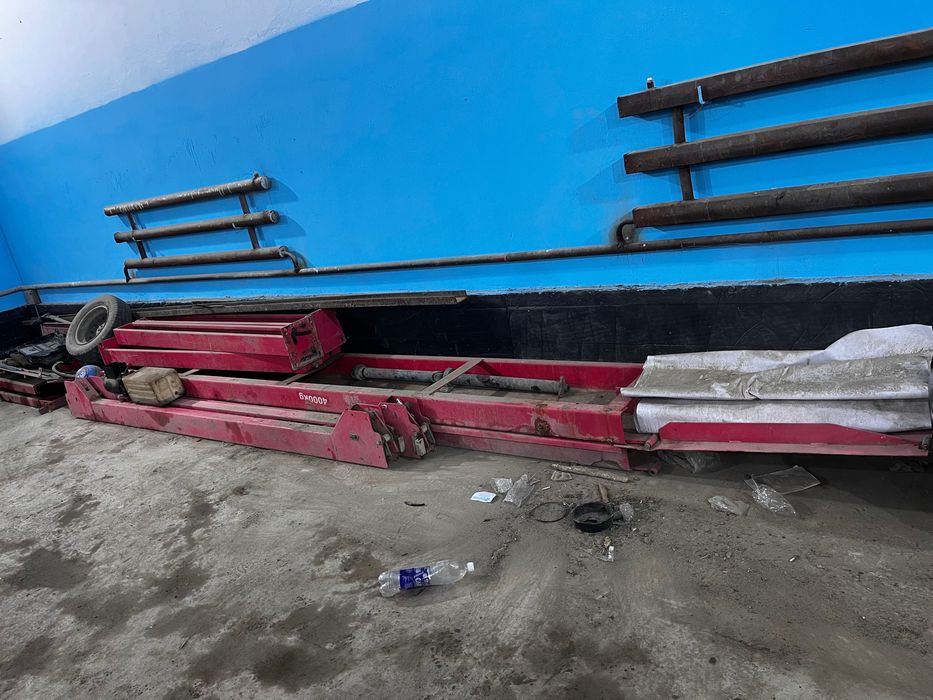 Подьемник для автомобиля Сто