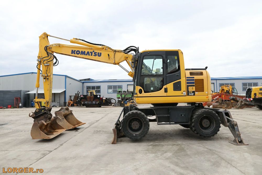 Komatsu PW148-10 Excavator pe pneuri Komatsu PW148-10
