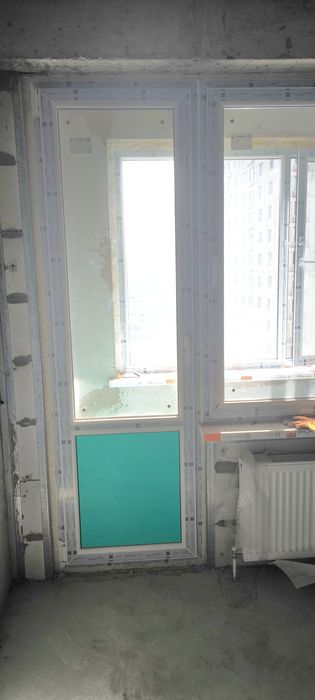 Пластиковые балкон и окно