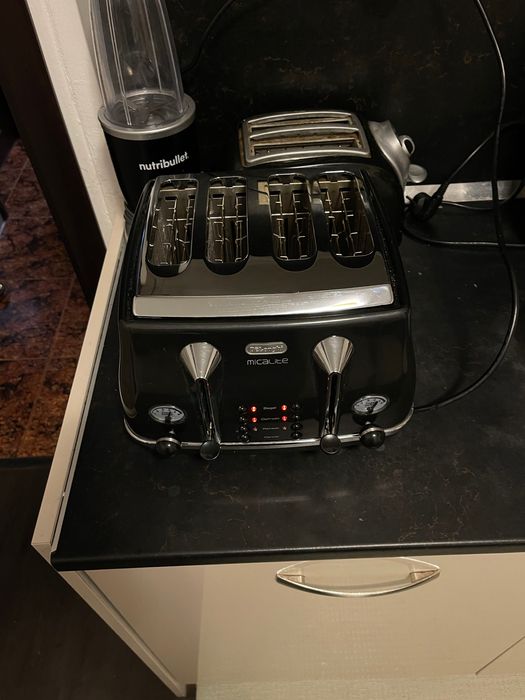 Тостер Delonghi с четири гнезда