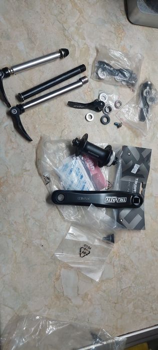 Axuri Suntore ,brati angrenaj stang Truvativ butuc fata Shimsno disc