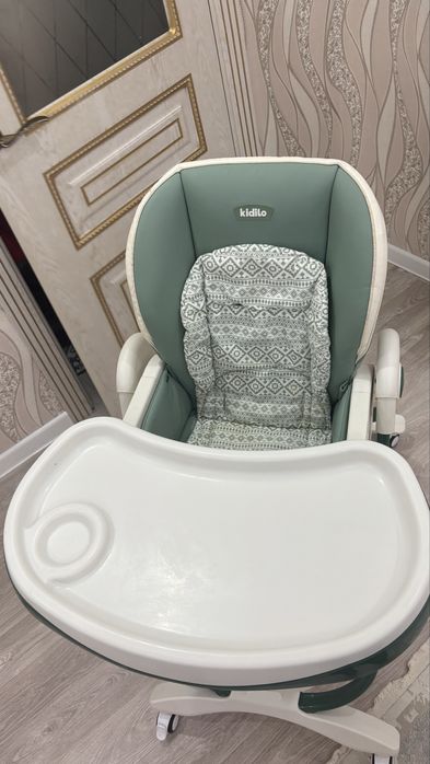 Kidilo.Стульчик для кормления