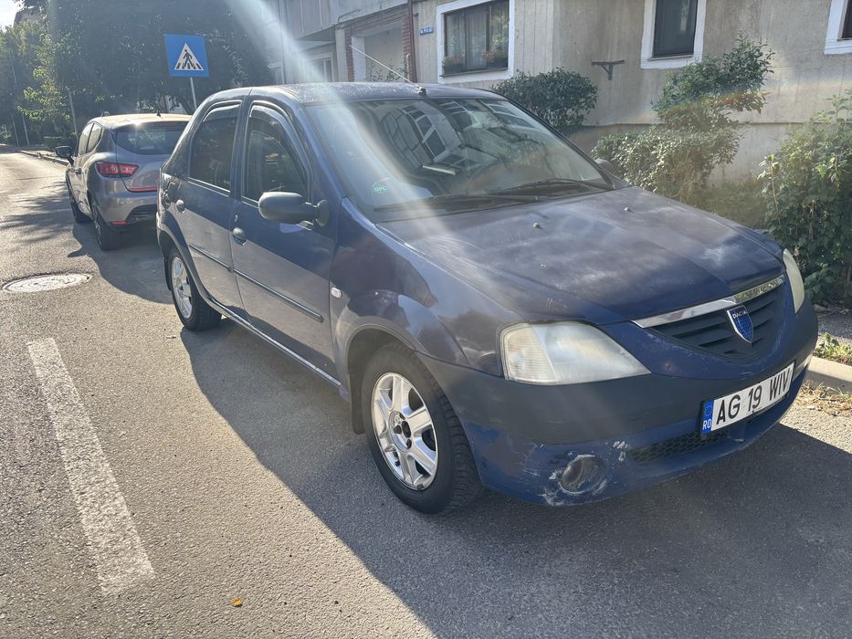 Logan 1.4 bezina cu gaz.