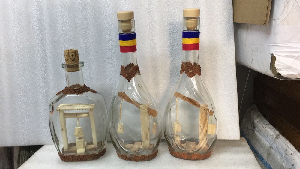 Sticle cu sculptura din lemn