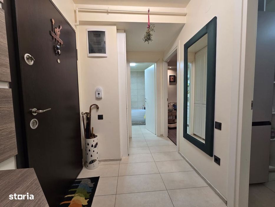 COSMOPOLIS - Apartament cu 2 camere si gradina, mobilat si utilat.