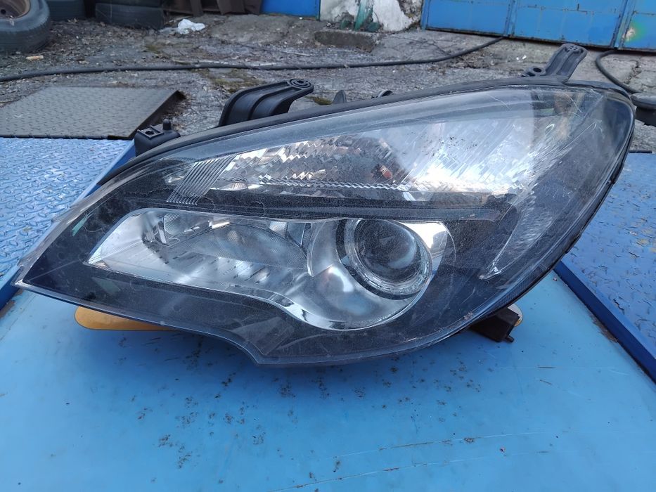 Оригинален ляв фар за Chevrolet Aveo T300 (2011-2015) - GM 95095502