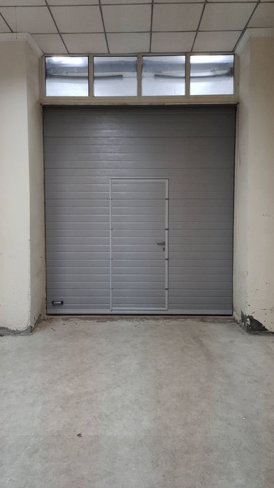 Секционные ворота Door Han